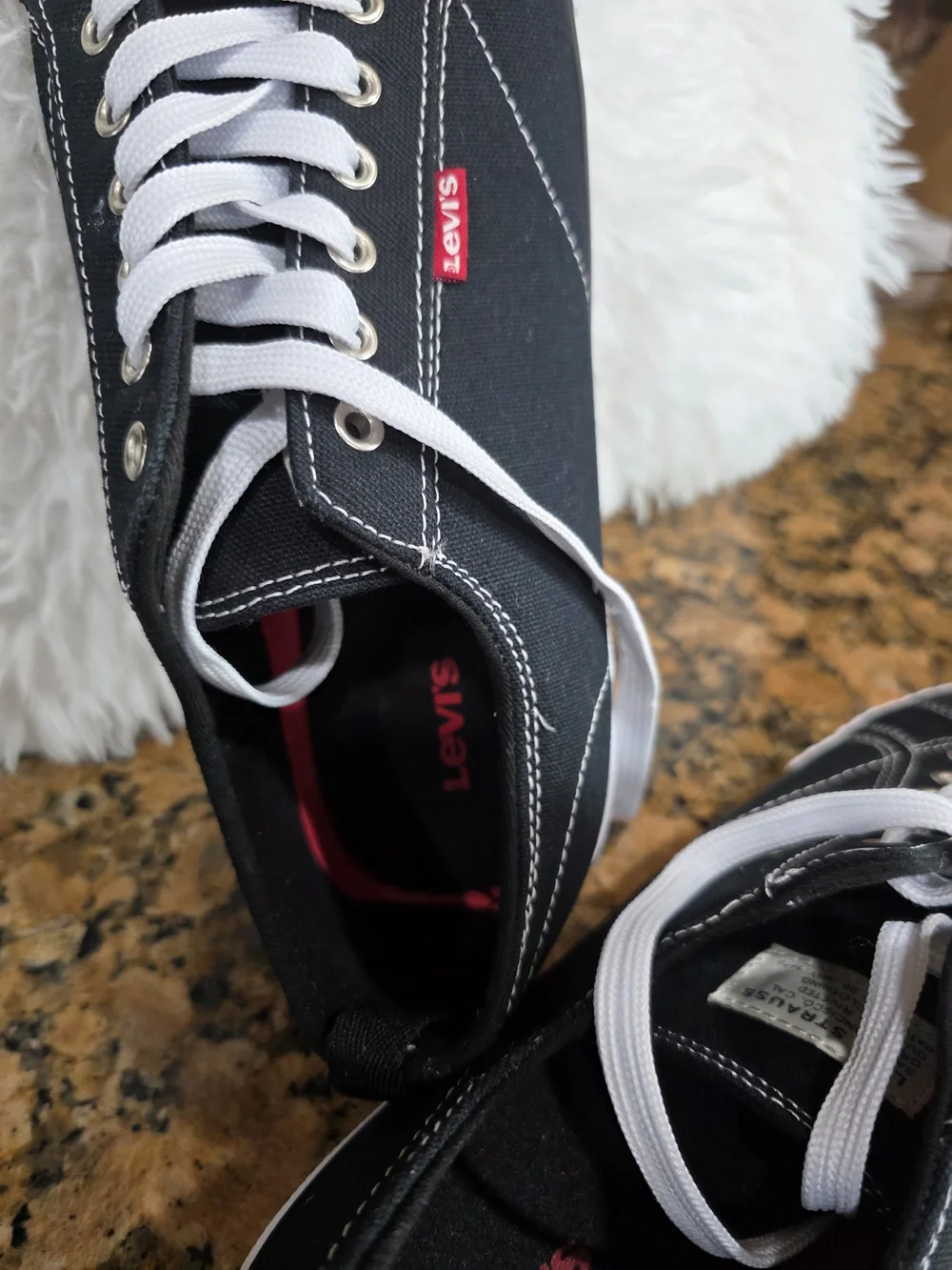 Levi's Men's Black Canvas Low-Top Sneakers with White Accents and Red Tab
